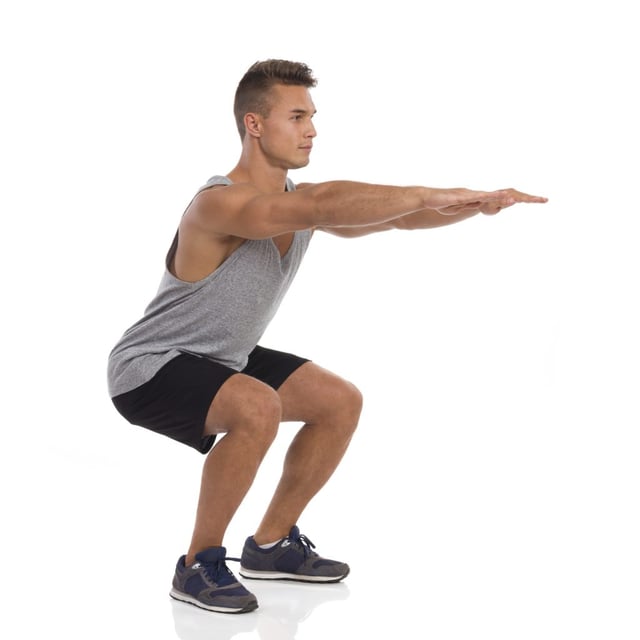 Man doing squat.